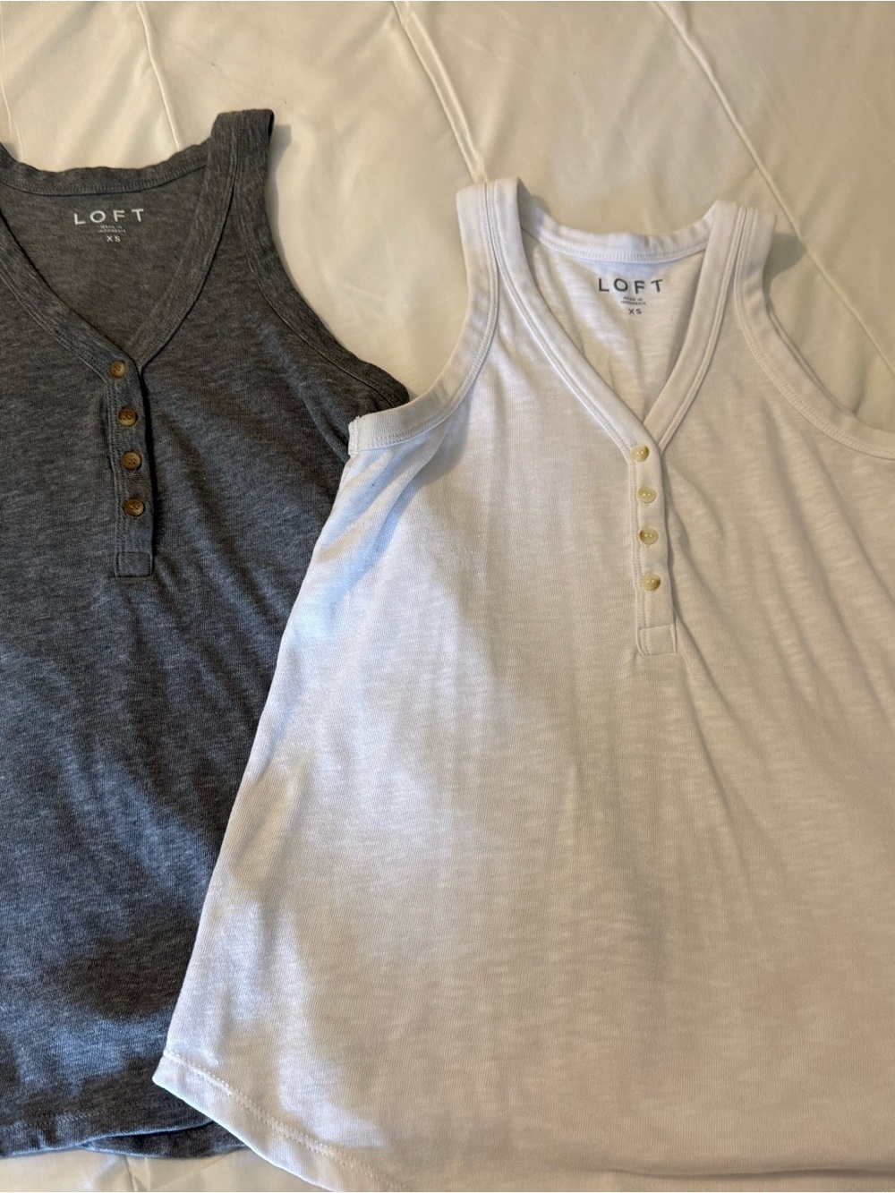 Two LOFT Henley tank tops